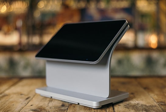 A MICROS Workstation 8 fixed point-of-sale terminal in its upright configuration